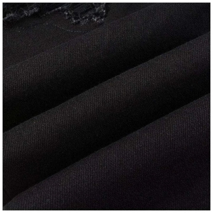 Black leather patch biker jeans